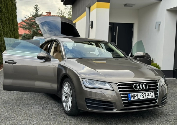 Audi A7 cena 84200 przebieg: 168000, rok produkcji 2014 z Płock małe 631